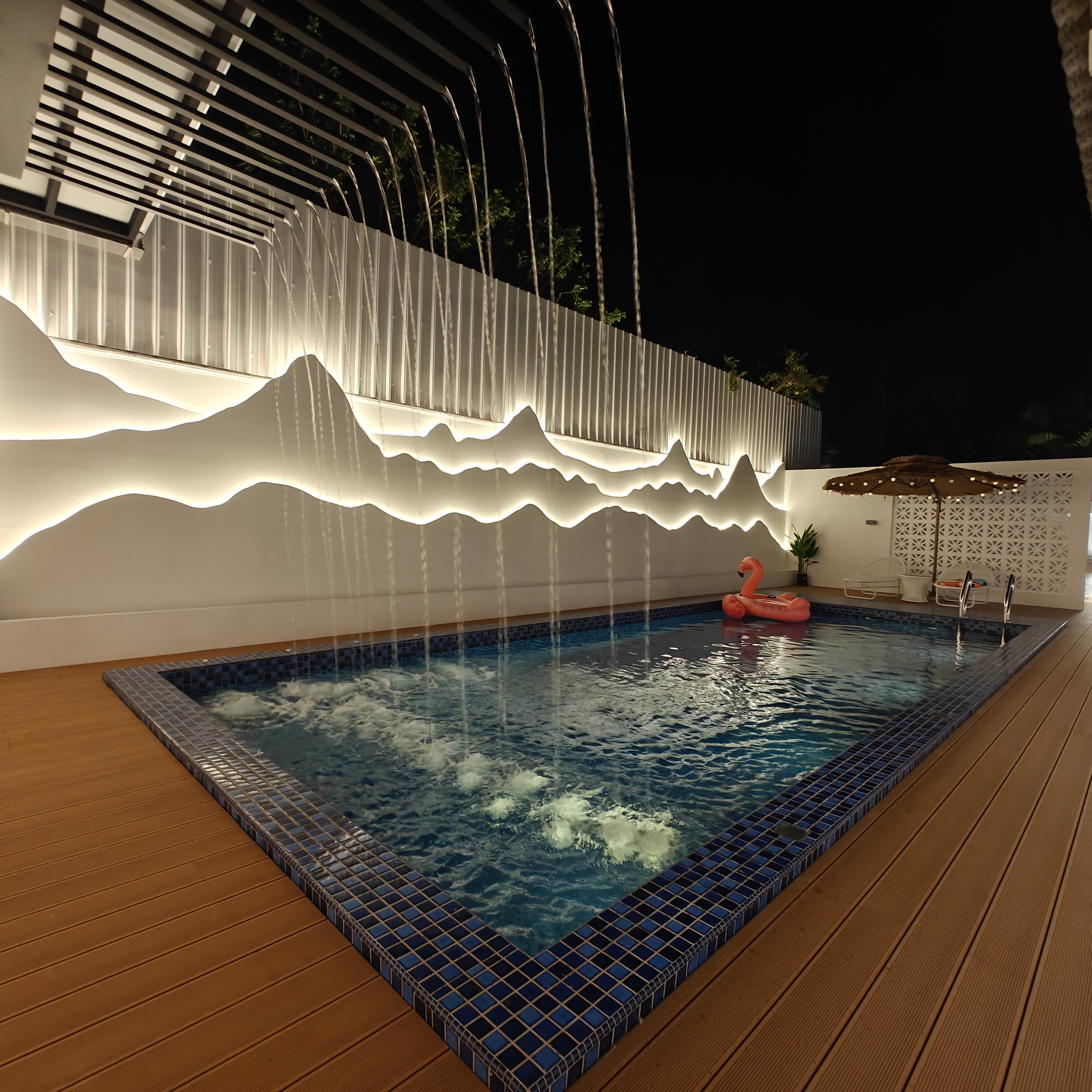 La'Dolce Villa — Water curtain at night