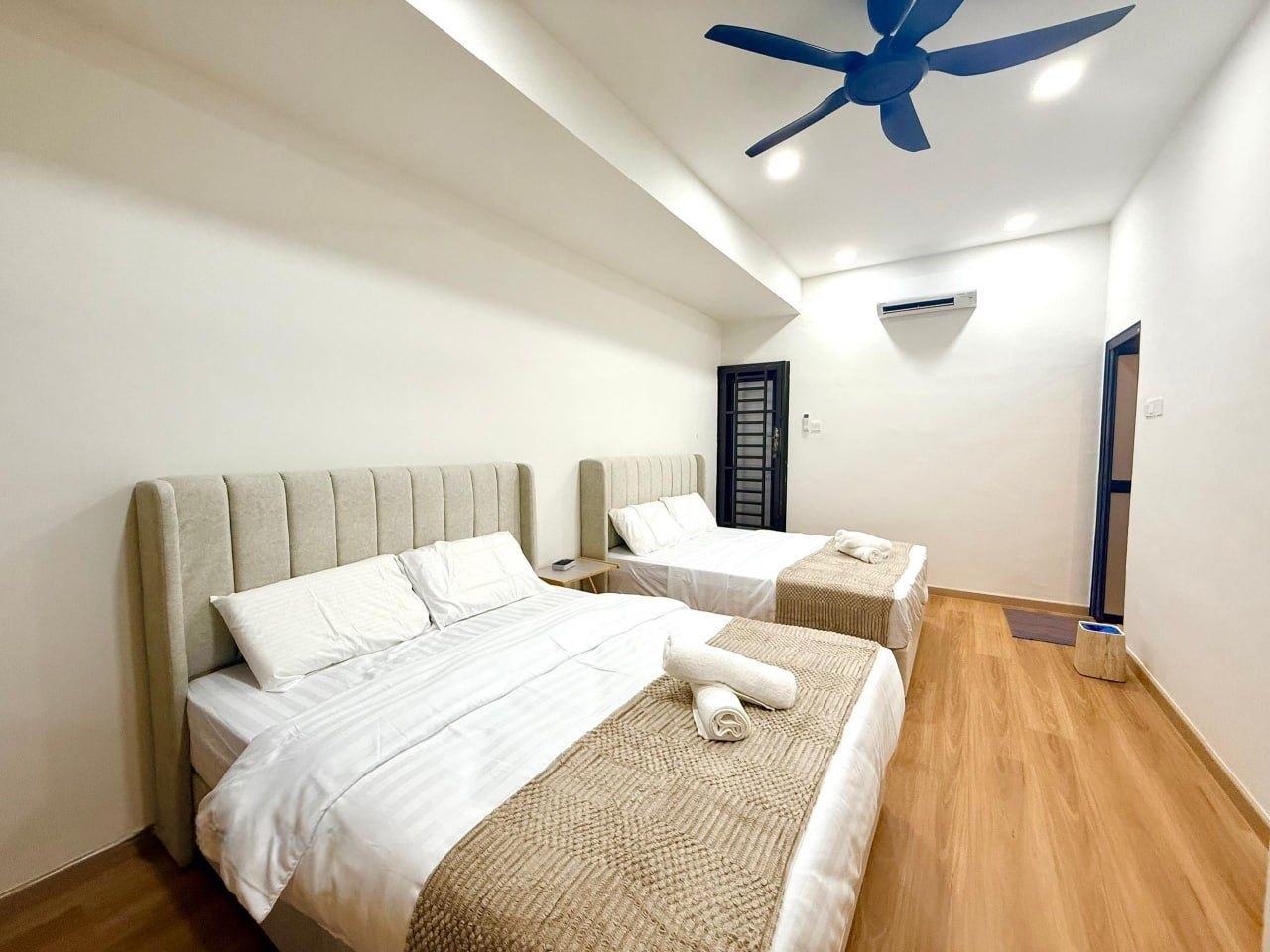 Twin Queen Bedroom